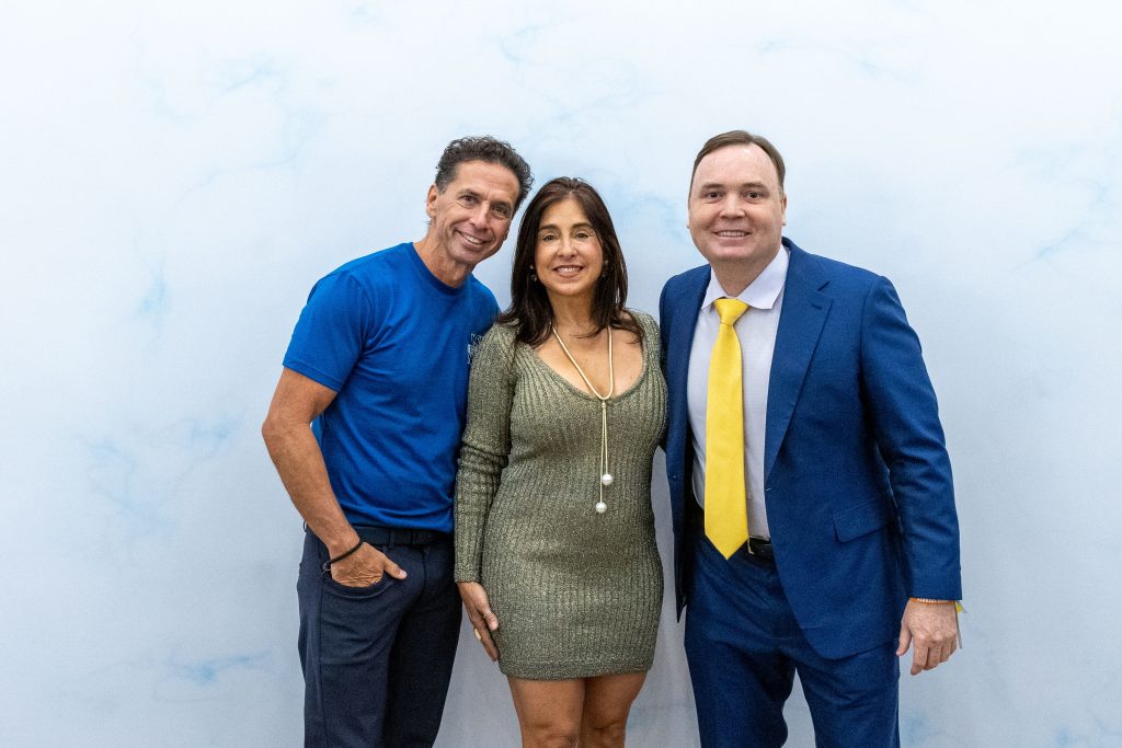 Clint with Bobby and Sophia Castro who sold their business for over $1 billion