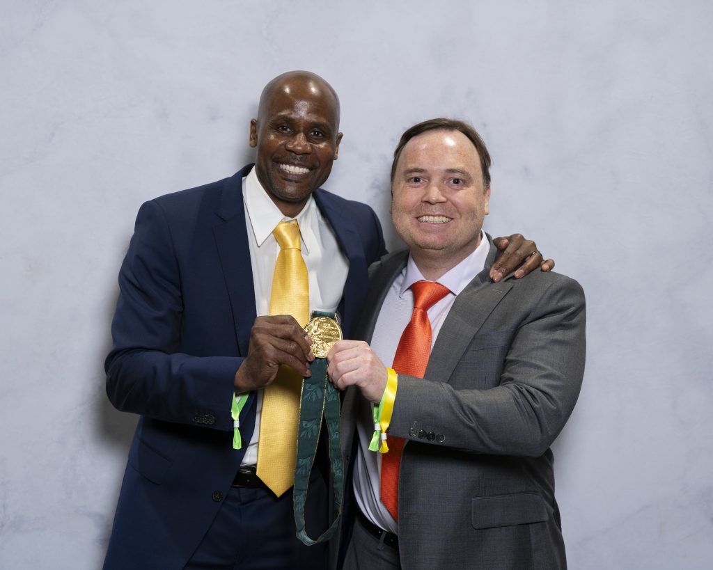 Clint with Charles Austin Olympic Gold Medalist
