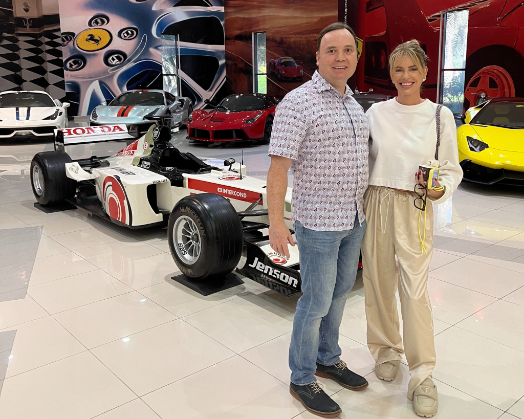 Clint and Caroline Stanbury at the crown prince's race car personal garage