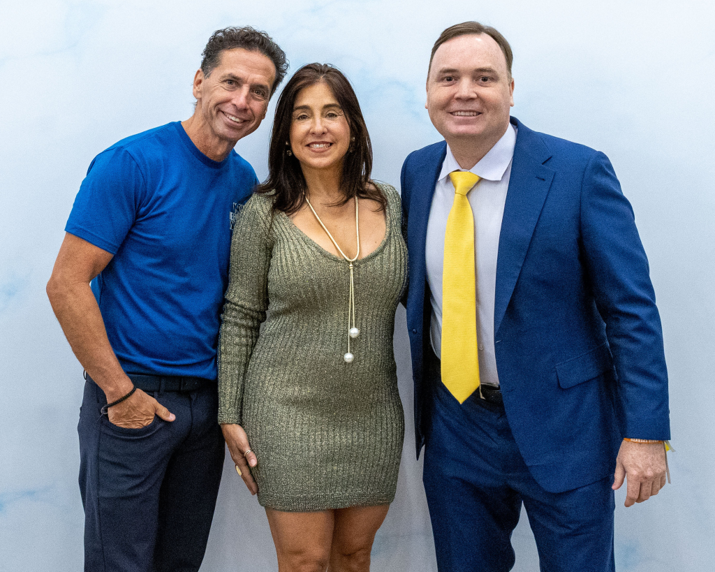 Clint with Bobby and Sophia Castro who sold their business for over $1 billion