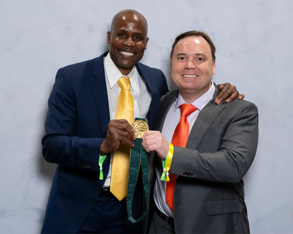 Clint with Charles Austin Olympic Gold Medalist