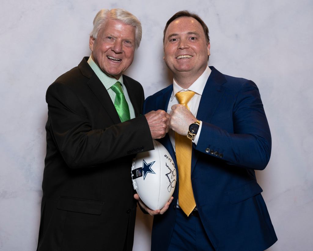 Clint with Jimmy Johnson, Super Bowl champion, next Dallas Cowboys coach and Miami hurricanes coach, NFL TV announcer