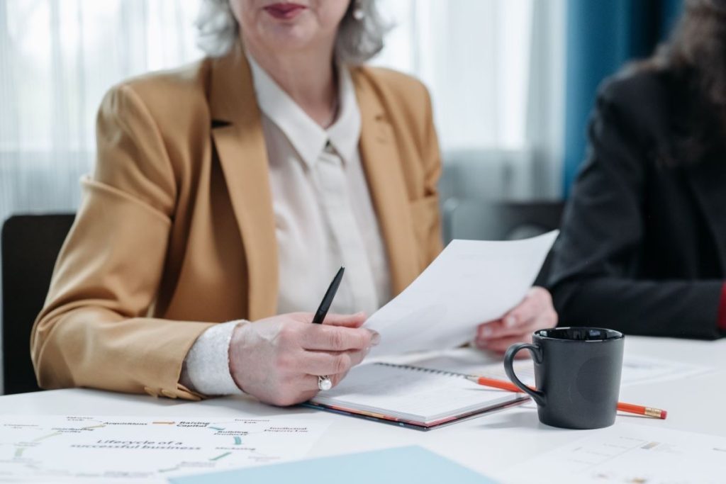 Business owner working through documents during the due diligence period