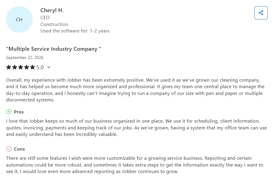 Capterra review of Jobber praising its organization while asking for more advanced reporting
